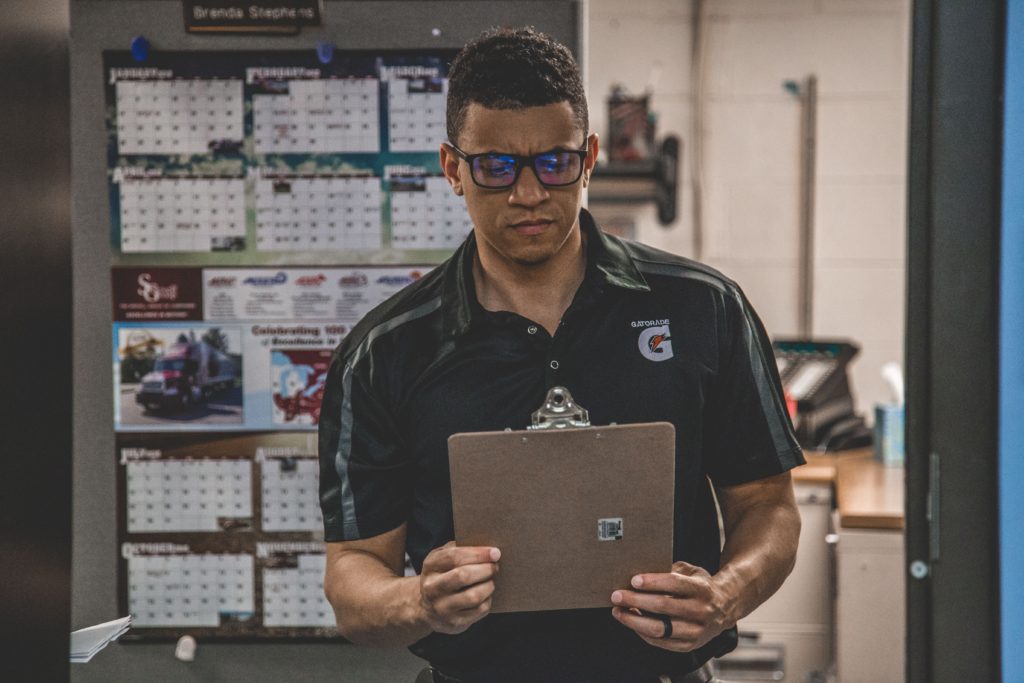 Warehouse worker managing material